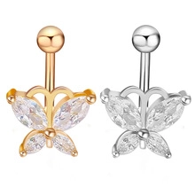 Detail of butterfly belly rings in gold and silver finish with marquise cubic zirconia