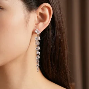 Sparkling silver fringe earrings with rectangular cubic zirconia stones in a dangling design