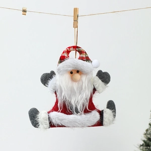 Detailed view of handmade Santa Claus ornament with red plaid hat and plush white beard