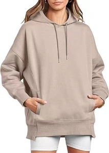 Detail of oversized khakis hoodie showing kangaroo pocket and drawstring hood features
