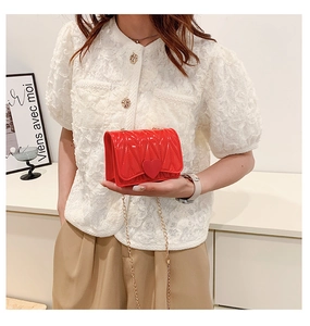 Girl's red mini heart crossbody bag with V-quilted texture and metal chain strap