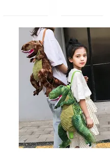 Outdoor view of cute dinosaur plush backpacks in brown and green with adjustable straps