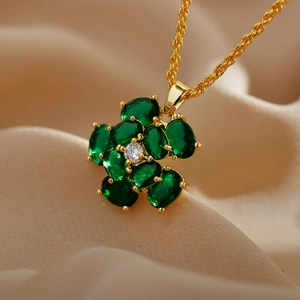 Elegant gold-plated flower necklace with green malachite petals and center crystal stone