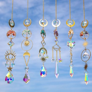 Golden Tree of Life crystal suncatchers with moon and star prisms for garden windows