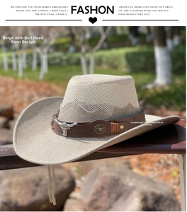 Close-up of beige cowboy hat with breathable mesh crown and silver bull head stud