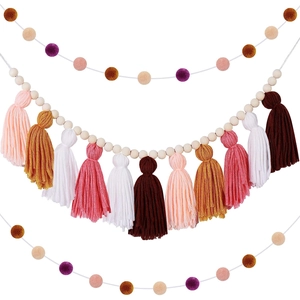 Nordic wooden bead garland with colorful cotton tassels and pom poms for wall decoration
