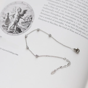 Elegant stainless steel silver bracelet with five sparkling cubic zirconia stones