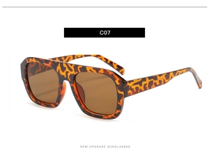 Side view of square oversized tortoiseshell sunglasses with brown lenses and wide temples