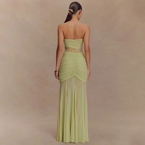 Light green strapless maxi dress with pleated details and sheer mesh back design