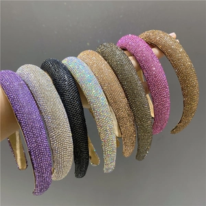 Padded rhinestone headbands in multiple colors for a sparkling high-crown hair look