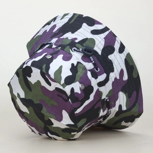 Detail of camouflage outdoor bucket hat with adjustable black drawstring and metal eyelets
