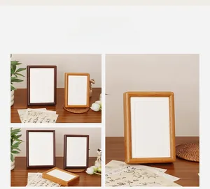 Detail of solid wood photo frame showing mortise and tenon joints in walnut and oak