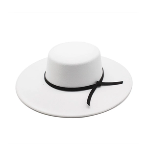 Elegant white flat top wool boater hat with black ribbon detail on white background