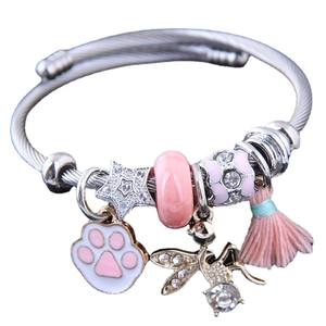 Pink charm bracelet with cat paw enamel pendant and silver tassels for women