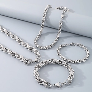 Polished silver stainless steel chain jewelry set featuring necklaces and bracelets