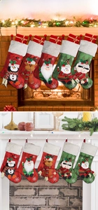 Detailed view of five Christmas stockings with 3D characters on a fireplace mantle
