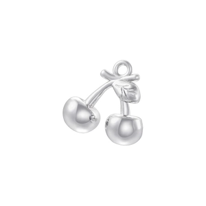 Macro detail of silver cherry pendant with smooth metallic finish and hanging ring