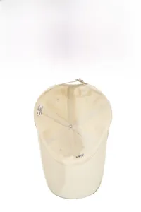 Detail showing internal reinforced cotton band and adjustable metal buckle on baseball cap