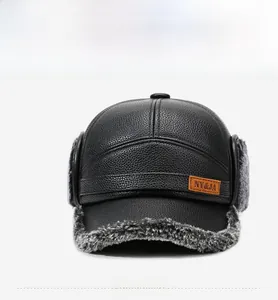 Detail view of winter leather baseball cap with gray faux fur lining and ear flaps
