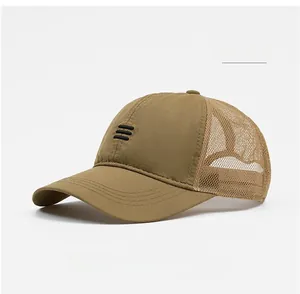 Detail of khaki breathable mesh fabric and quick-dry polyester material on baseball cap