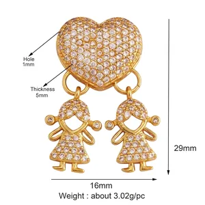 Gold heart pendant with two girls set in micro-paved zircons measuring 29mm by 16mm