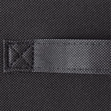 Macro view of black non-woven fabric storage box with reinforced cross-stitching detail