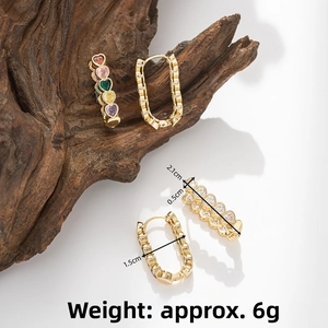 Detailed view of colorful heart-shaped zircon earrings with precise size measurements