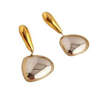 Polished 18K gold and silver two-tone teardrop earrings in minimalist pebble style