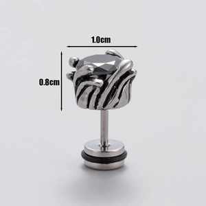 Macro view of gothic men's stainless steel stud earring with black zircon stone inlay