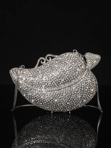 Luxurious silver shell clutch bag with sparkling rhinestones and delicate metal chain