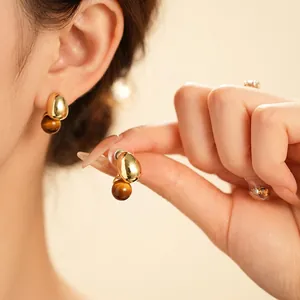 Vintage gold teardrop stud earrings with brown tiger eye faux amber beads for women