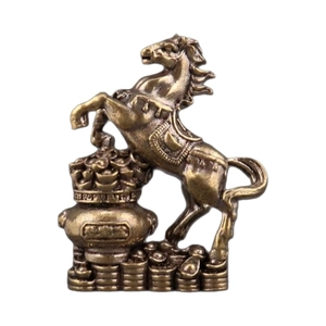 Traditional brass horse statue on treasure bowl with gold coins for wealth feng shui decor