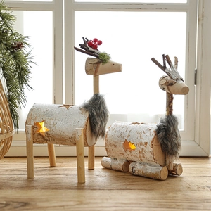 Set of two handmade wooden Christmas reindeer ornaments with star cutout LED lighting