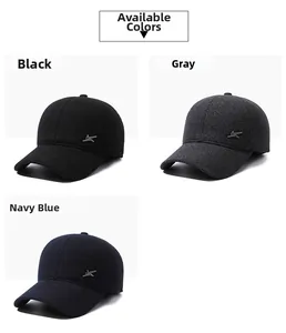 Detailed view of winter baseball caps in black, grey, and navy blue wool textures