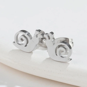 Minimalist silver snail stud earrings in polished stainless steel for a cute nature look