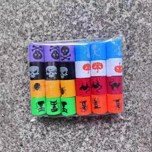 Colorful Halloween mini spring toys with skull and pumpkin patterns in clear bag