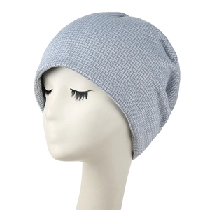 Light blue slouchy knitted beanie hat for women featuring soft waffle knit texture
