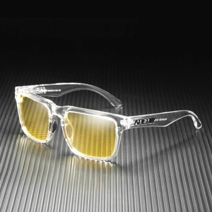 Detail of square polarized sunglasses with transparent frame and yellow lenses