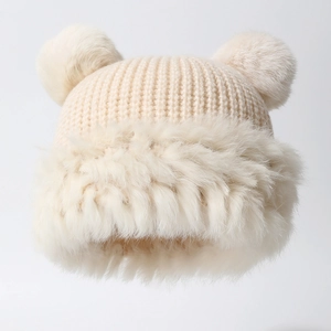 Winter knitted warm hat with cute bear pompom ears and beige plush fur trim