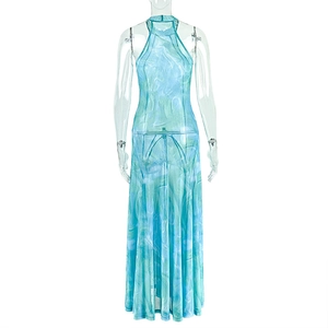Detail of backless halter maxi dress featuring blue and green abstract marble print mesh