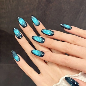 Starry night gradient blue cat-eye long oval press-on nails with silver glitter sparkles