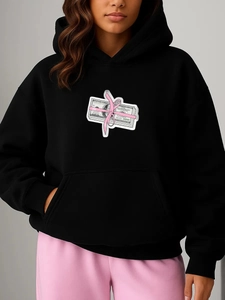 Loose black hoodie with American dollar print and pink ribbon graphic for street fashion