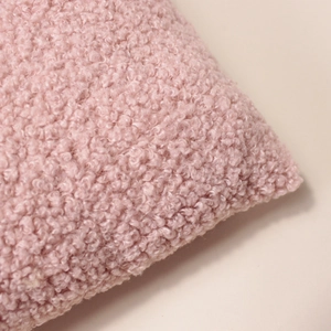 Close-up of pink teddy fleece fabric texture and stitching on the nursery organizer