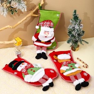 Three 3D cartoon Christmas stockings featuring Santa, Snowman and Reindeer characters