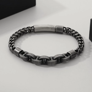 Detailed close-up of retro silver keel chain bracelet with H-link clasp for men