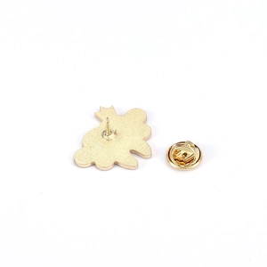 Golden alloy dental pin back view with metal butterfly clutch and sharp fixing needle