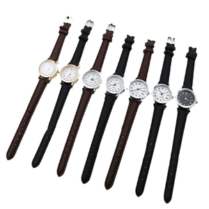 Set of seven minimalist women's quartz watches with leather straps and round dials