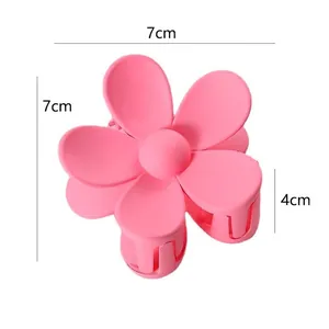 Pink matte flower hair claw clip 7x7cm for ponytail and elegant hair styling