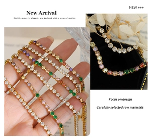 Detail of gold-plated tennis bracelet featuring multicolored faceted zircon stones