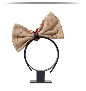 Detailed view of burlap bow headband with red stitch cross for Halloween cosplay